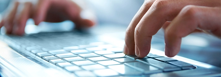 Chiropractic Bakersfield CA Hands On A Keyboard Person typing on a keyboard.
