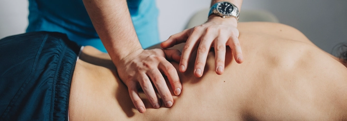 Chiropractic Bakersfield CA Soft Tissue Therapy Patient receiving soft tissue therapy on their back.