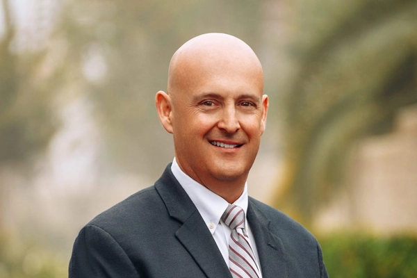 Chiropractor Bakersfield CA Christopher Berry Dr. Christopher Berry smiling outside.